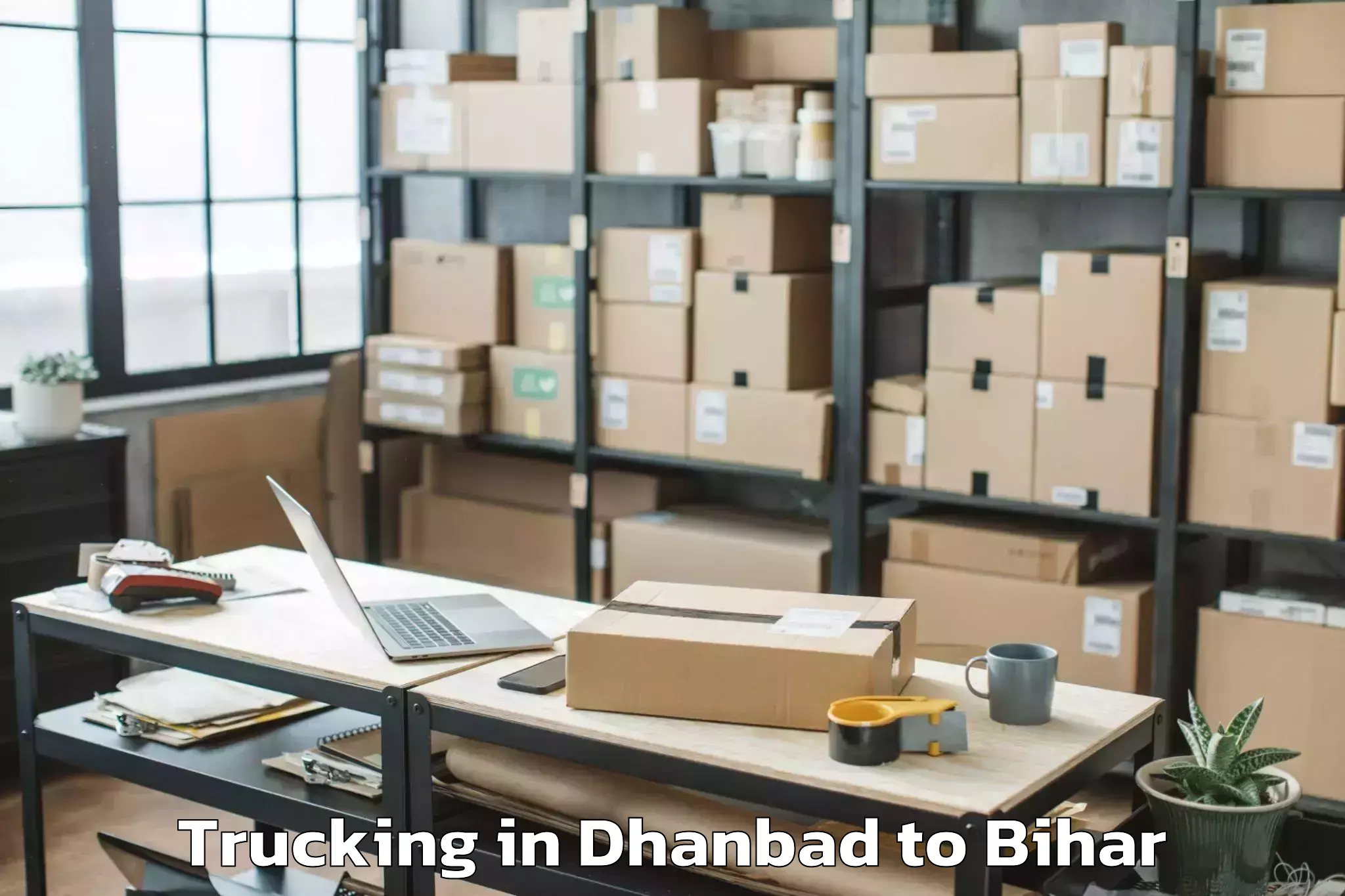 Affordable Dhanbad to Tilka Manjhi Bhagalpur Univers Trucking